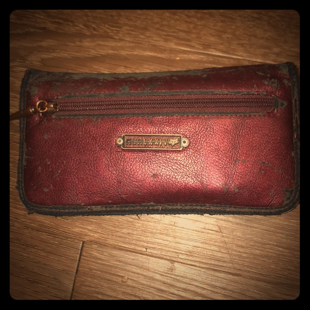 Women’s Fox Tracing wallet. Old and worn.